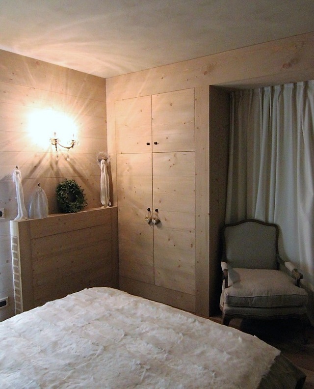 wood panneled bedroom