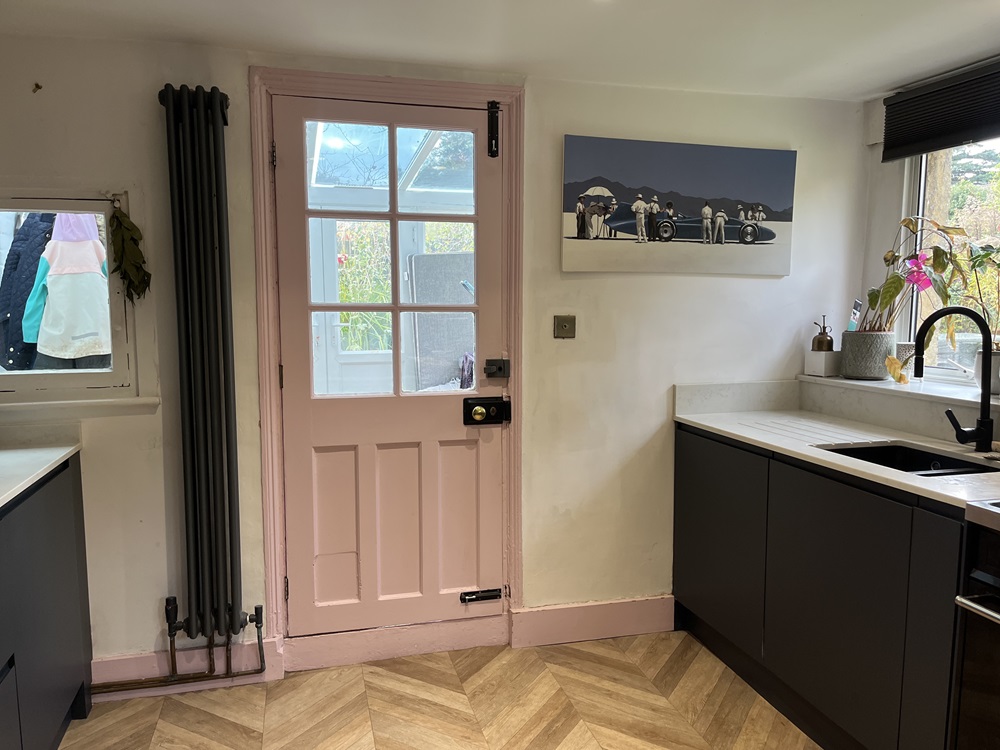 painting a pink wooden door